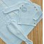Conjunto polainas hilo bolero botones
